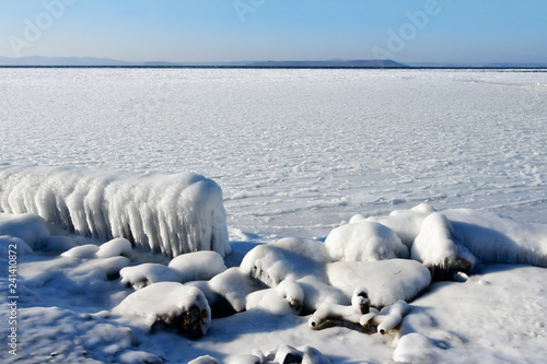 Russia. Vladivostok, the store of Amur Bay, Yubileyny beach in winter photo