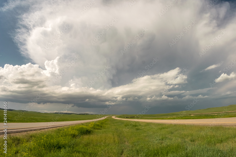 A supercell thunderstorm over the highway in South Dakota A supercell thunderstorm over the highway in South Dakota