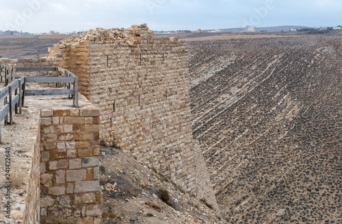 The Corner tower in the medieval fortress Ash Shubak, standing on a hill near Al Jaya city in Jordan photo