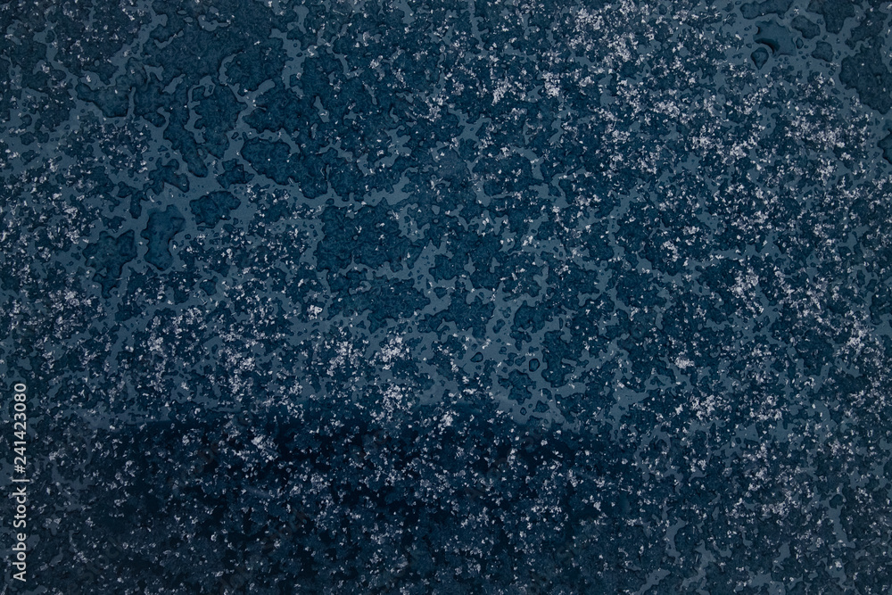 the texture of the snow,the frozen glass of the car the texture of the snow,the frozen glass of the car