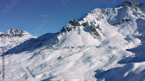 Wallpaper Mural Aerial view of Swiss Alps mountains in winter, snow on slopes, sunny day with blue sky - ski resort St. Moritz, landscape panorama of Switzerland, Europe Torontodigital.ca