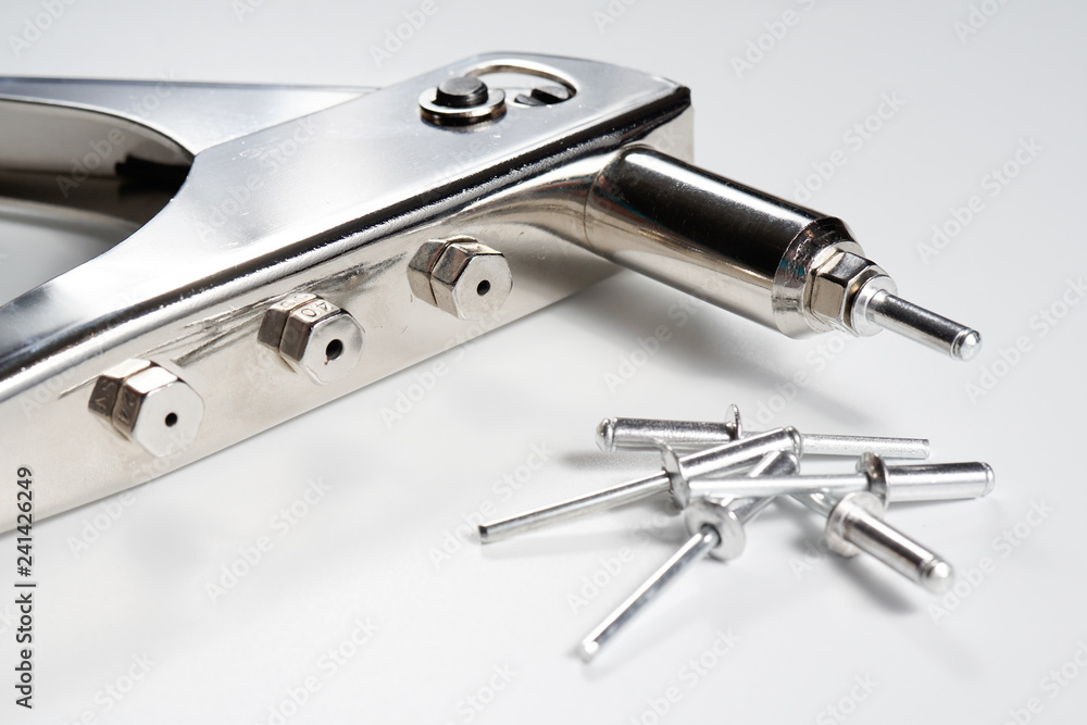 Rivet gun with rivets Rivet gun with rivets