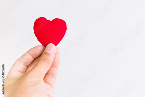 man holding hands heart on white background