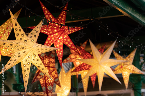 Ornamental Stars That are Hand-crafted and Illuminated for Christmas  Harrogate Christmas Market  North Yorkshire  England  UK.
