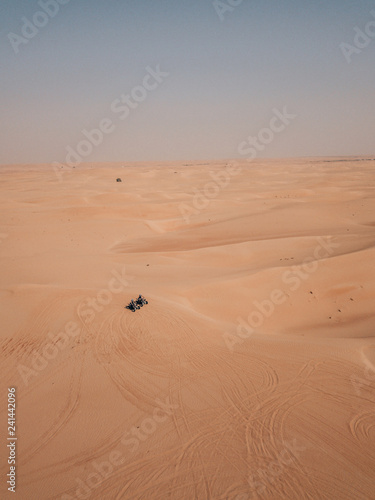 Riding a Quad through the endless desert