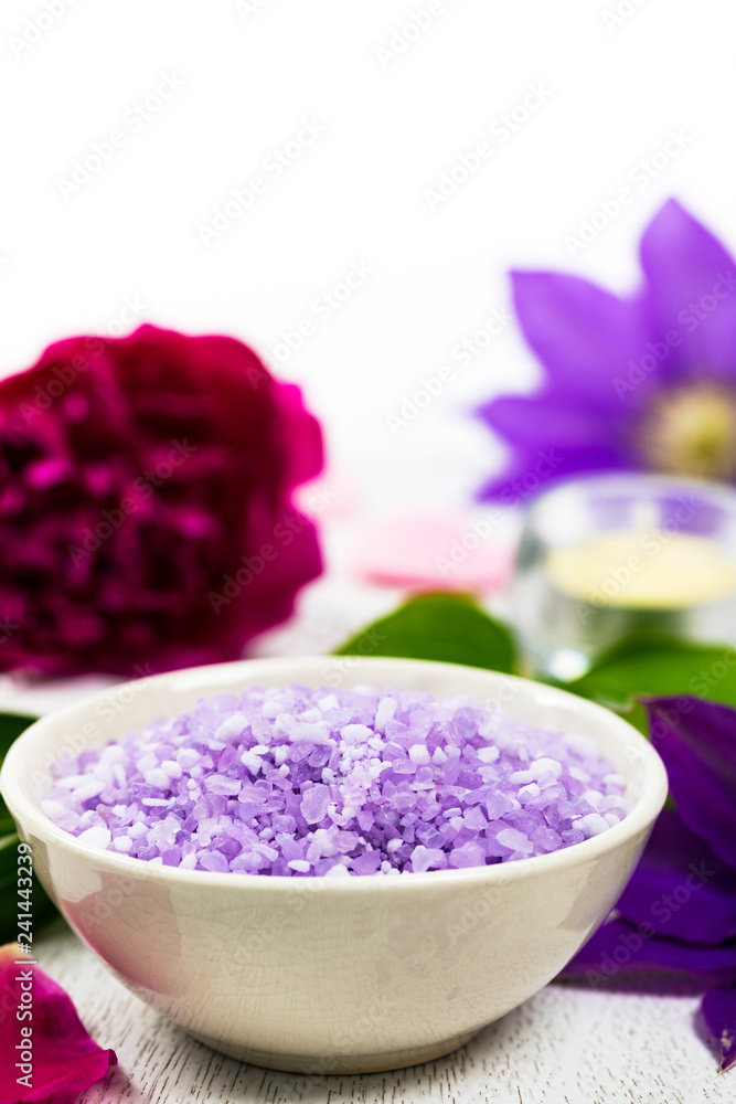 Purple Clematis Spa Salt for Spa and Aromatherapy. Selective focus. Purple Clematis Spa Salt for Spa and Aromatherapy. Selective focus.