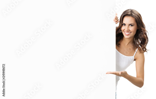 Beautiful young woman with blank signboard photo