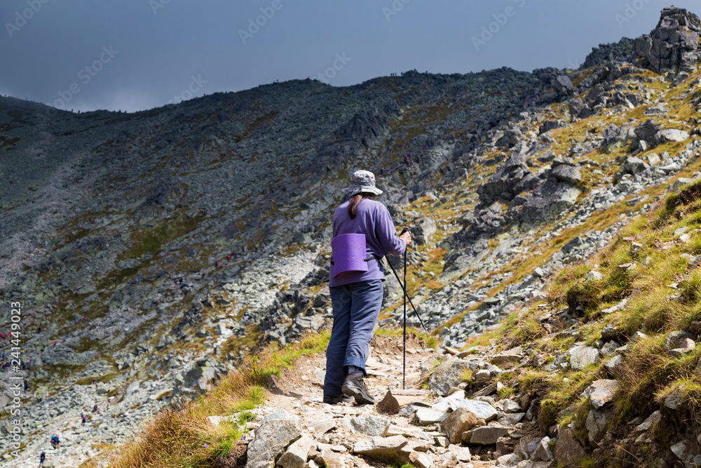 Woman on mountain footpath . Mountain  Krivan.  Slovakia.