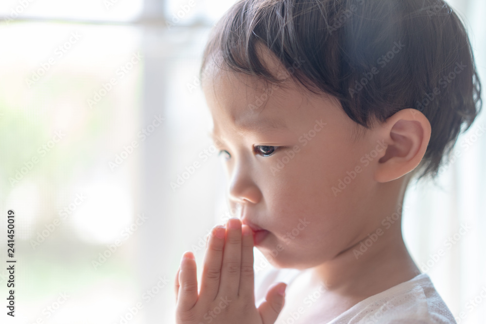 A little prayer, A boy is praying seriously and hopefully to Jesus. A little prayer, A boy is praying seriously and hopefully to Jesus.