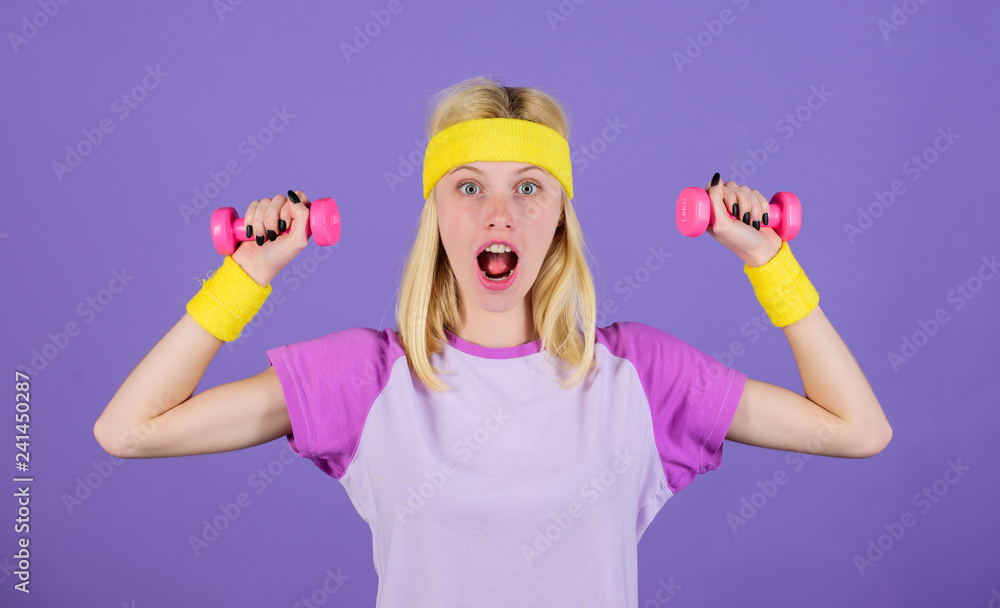Workout with dumbbells. Biceps exercises for women step by step guide. Girl hold dumbbells wear wristbands. Sport and fitness concept. Woman exercising with dumbbells. Easy exercises with dumbbells Workout with dumbbells. Biceps exercises for women step by step guide. Girl hold dumbbells wear wristbands. Sport and fitness concept. Woman exercising with dumbbells. Easy exercises with dumbbells