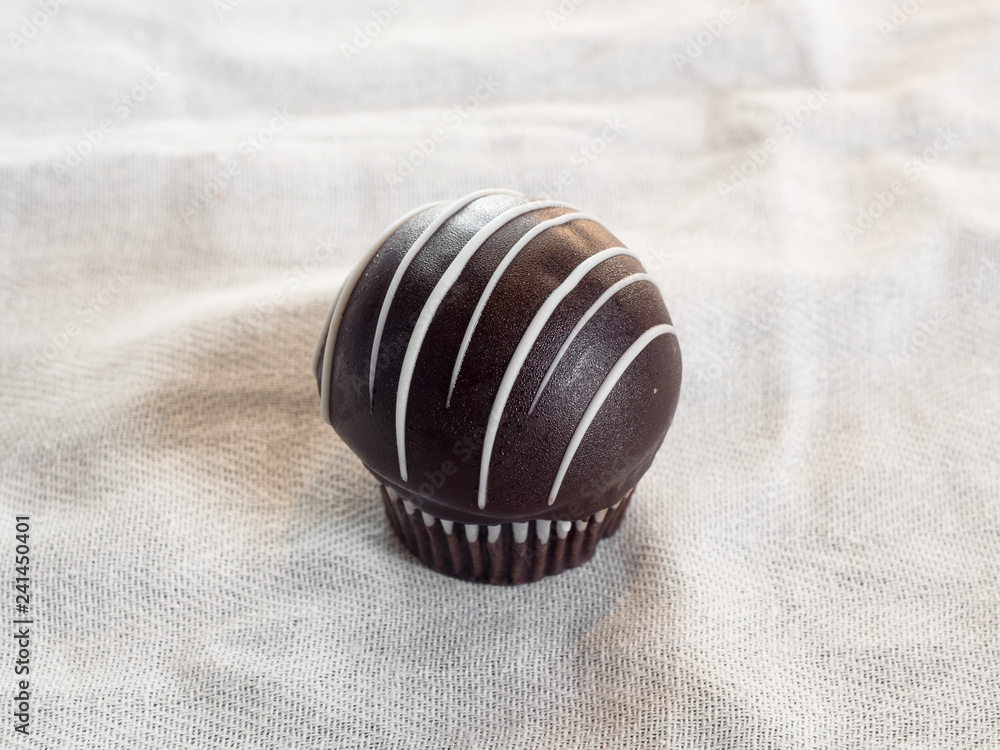Homemade cupcake with a hardshell sugary frosting. A tasty and small dessert treat. Homemade cupcake with a hardshell sugary frosting. A tasty and small dessert treat.