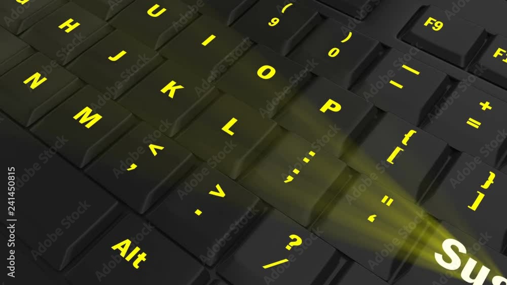 pointing the camera on yellow glowing Suggest key on black computer keyboard pointing the camera on yellow glowing Suggest key on black computer keyboard