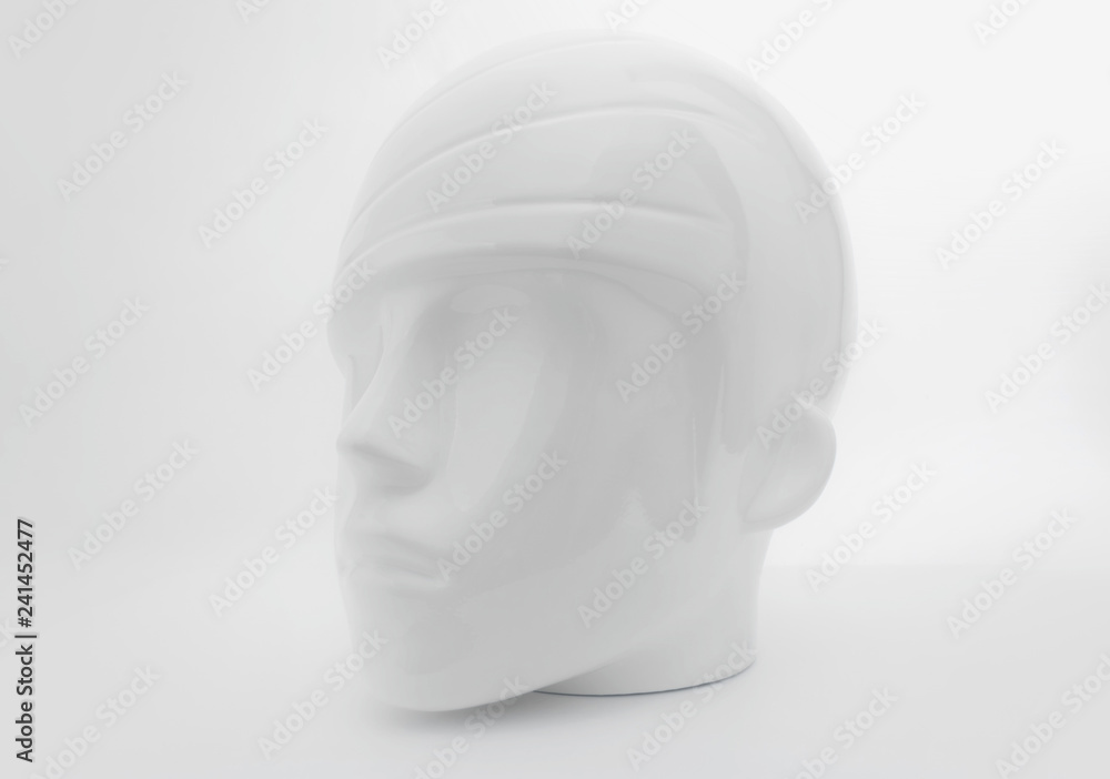White plastic human head from mannequin as soft object with shadows, shades of gray, mild style concept White plastic human head from mannequin as soft object with shadows, shades of gray, mild style concept