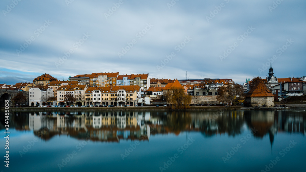 Reflection of building in the lent district on the river Drava in Maribor, SloveniaReflection of building in the lent district on the river Drava in Maribor, Slovenia