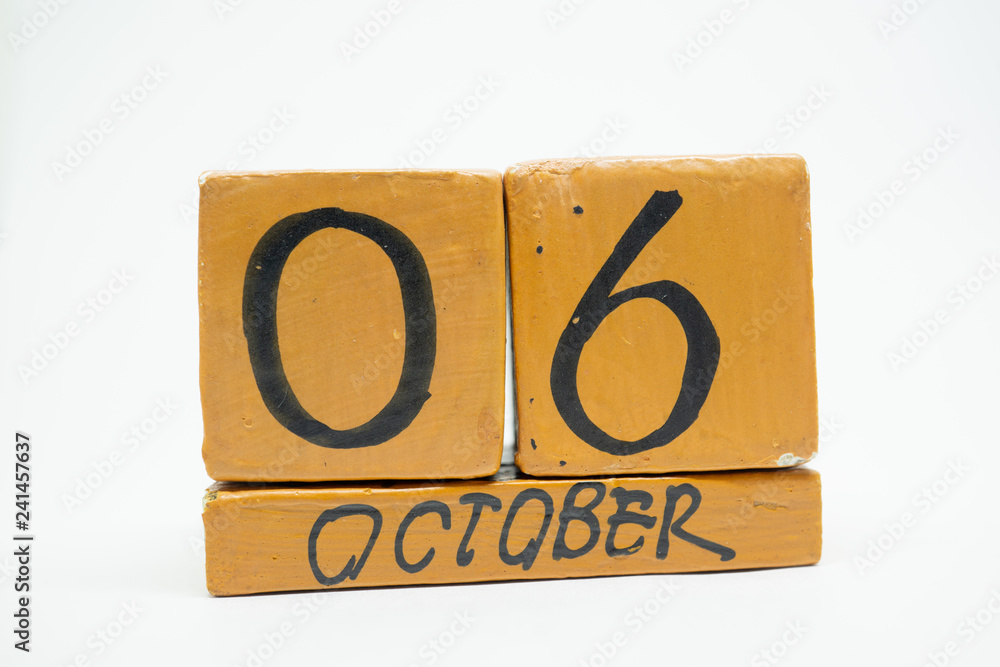 october 6th. Day 6 of month, handmade wood calendar isolated on white background. autumn month, day of the year concept october 6th. Day 6 of month, handmade wood calendar isolated on white background. autumn month, day of the year concept