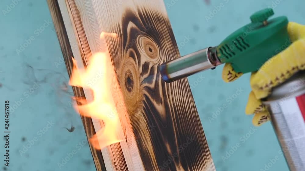 Fire flame concept Burning wood burner burns wood planking fire flames