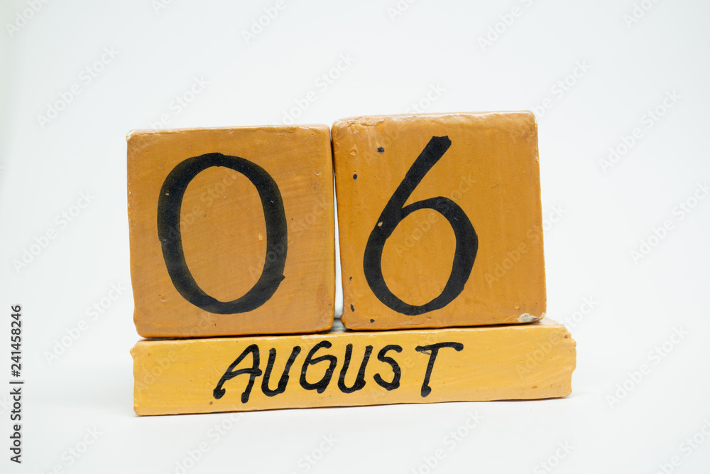 august 6th. Day 6 of month, handmade wood calendar isolated on white background. summer month, day of the year concept august 6th. Day 6 of month, handmade wood calendar isolated on white background. summer month, day of the year concept