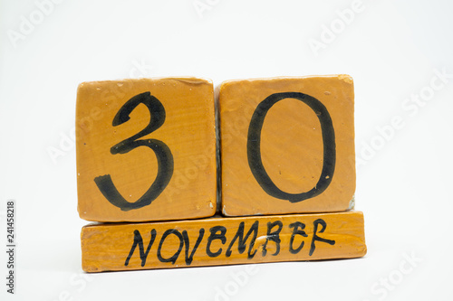 november 30th. Day 30 of month, handmade wood calendar isolated on white background. autumn month, day of the year concept