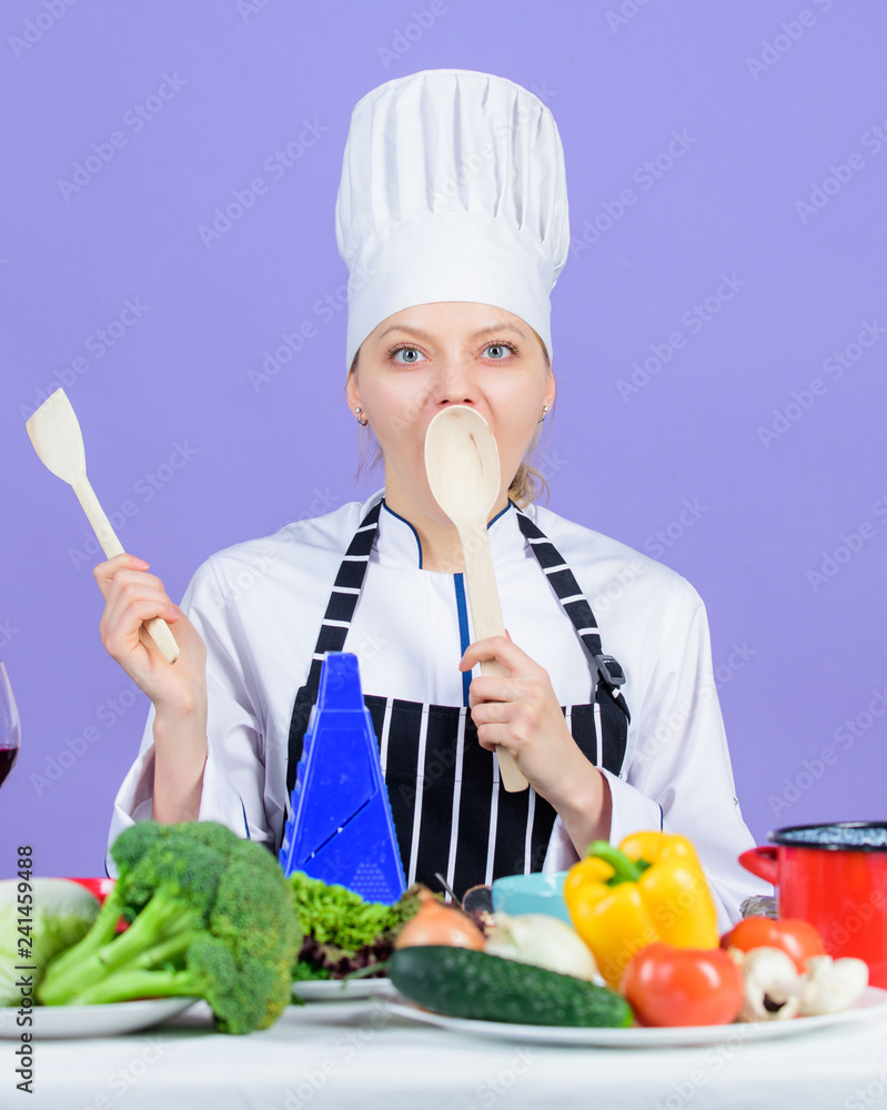 Cooking healthy food. Woman chef cooking healthy food. Fresh vegetables ingredients for cooking meal. Gourmet main dish recipes. Cooking is her hobby. Girl in hat and apron. Delicious recipe concept Cooking healthy food. Woman chef cooking healthy food. Fresh vegetables ingredients for cooking meal. Gourmet main dish recipes. Cooking is her hobby. Girl in hat and apron. Delicious recipe concept