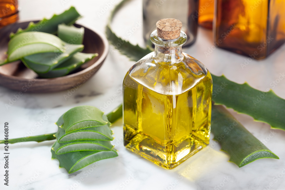 Aloe vera essential oil. Aloe vera oil for skin care, spa, wellness,  massage, aromatherapy. Medicinal plant Stock-Foto | Adobe Stock