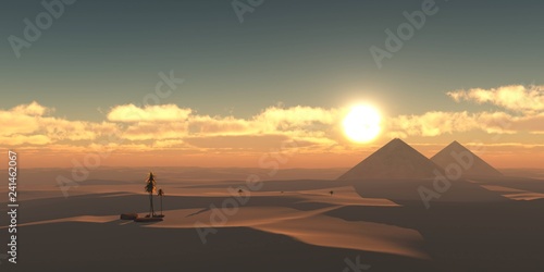 Sandy desert with pyramids at sunset, the sun over the sand, 