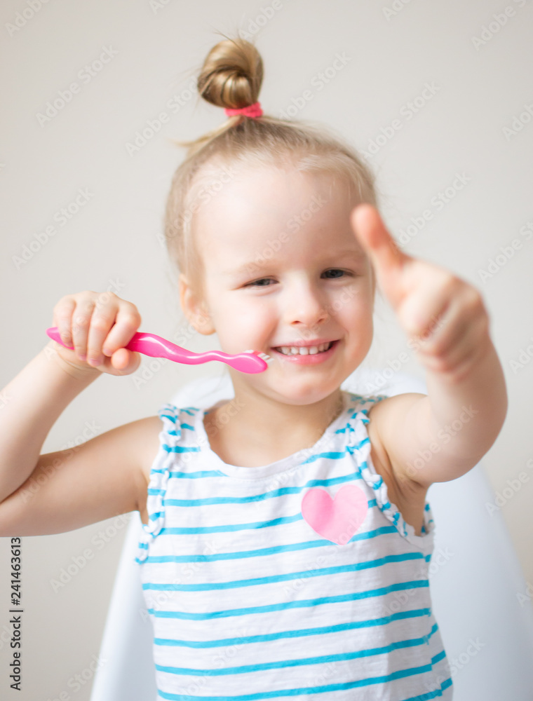 Happy Little Girl Brushing Her Teeth, Pink Toothbrush, Dental Hygiene, Morning Night Healthy Concept Lifestyle Happy Little Girl Brushing Her Teeth, Pink Toothbrush, Dental Hygiene, Morning Night Healthy Concept Lifestyle