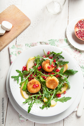 Quadro su tela Goat cheese, garden rocket and pomegranate salad.