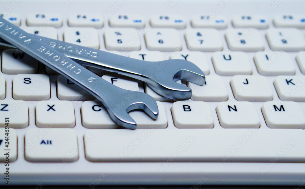 Wrenchs on keyboard.