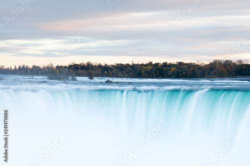 Принти на полотні The view across the Horseshoe Falls at dusk, a part of the Niagara Falls, viewed from the Canadian side