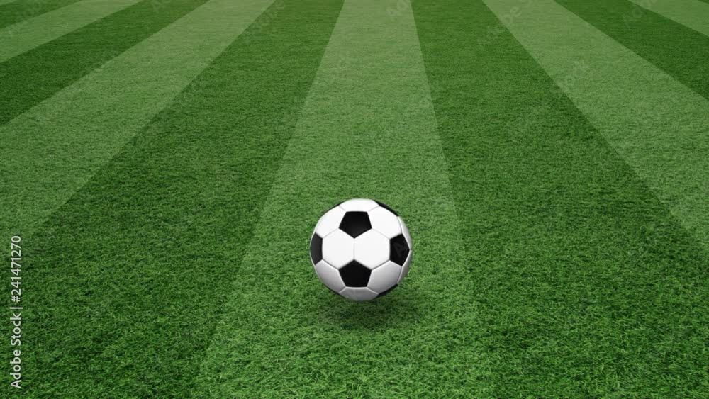 Sunny soccer ball bouncing on green textured football field. Sunny soccer ball bouncing on green textured football field.