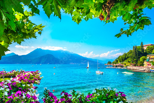 Fototapeta Naklejka Na Ścianę i Meble -  Varenna town bay beach and flowers, Como Lake district landscape. Italy, Europe.