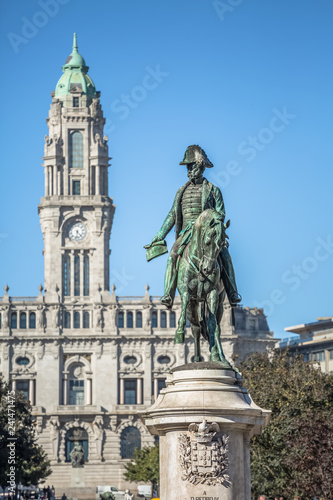 View at the Dom Pedro IV statue and city council building on background