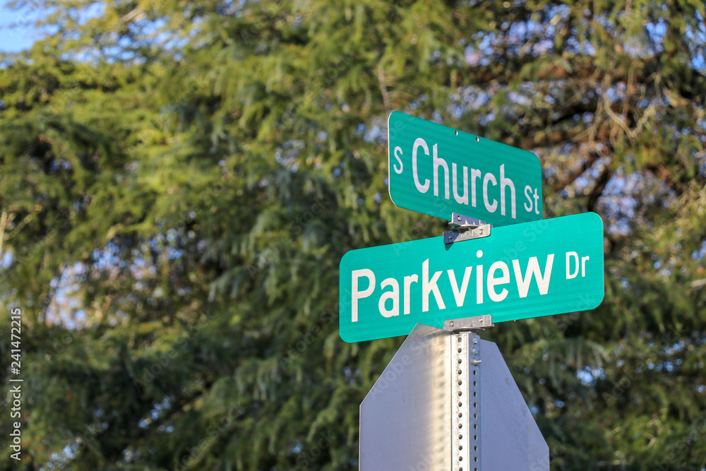 street signs at an intersection of church and parkview