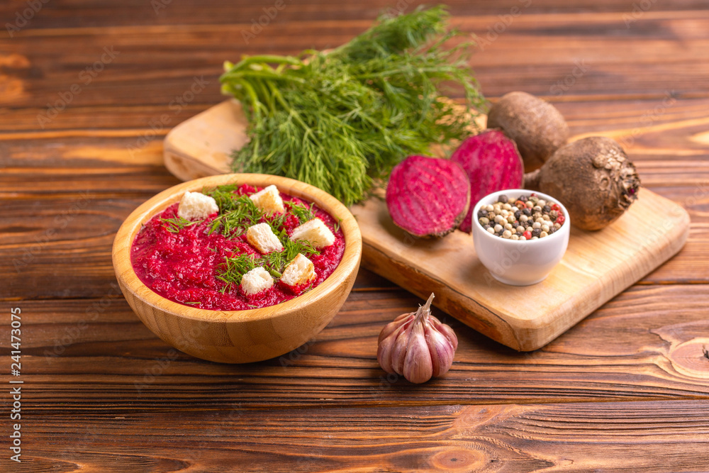 Bright tasty pureed beetroot soup with ingredients. Healthy food Bright tasty pureed beetroot soup with ingredients. Healthy food