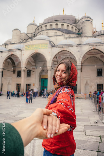 Follow me travel concept to Istanbul near Aya Sofia mosque, Turkey © gilitukha