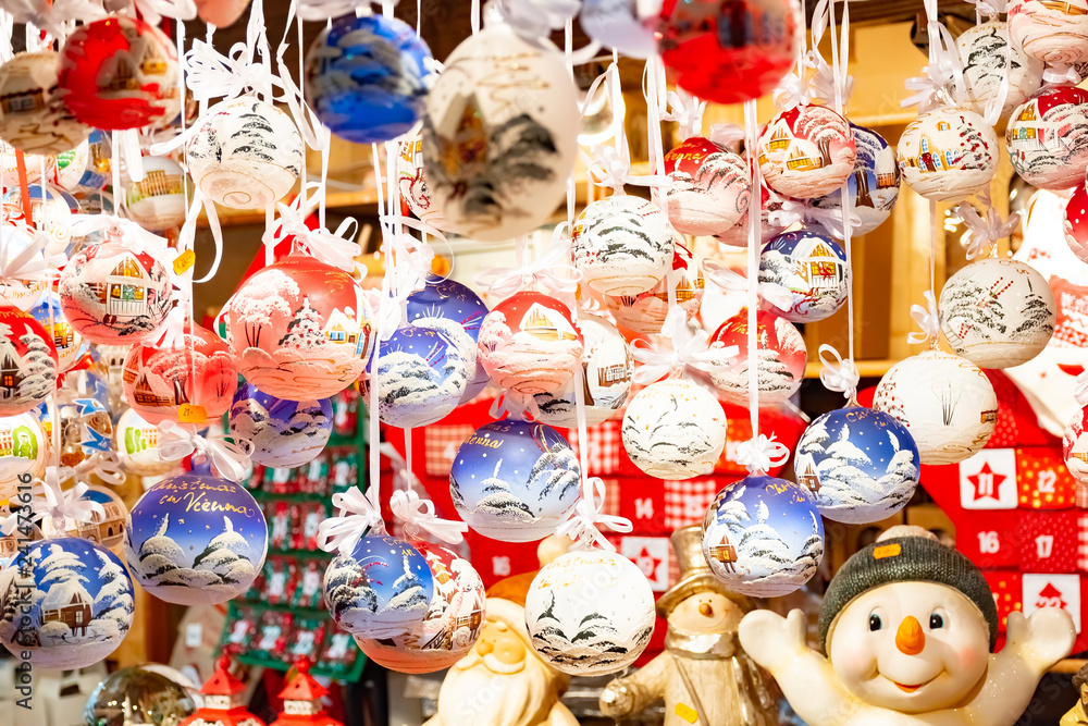 Beautiful colorful christmas decorations and balls in Wien Rathaus Market, Austria