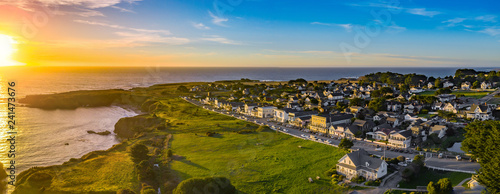 sunset over costal town