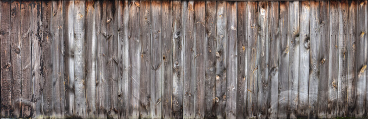 Brown wood colored plank wall texture background