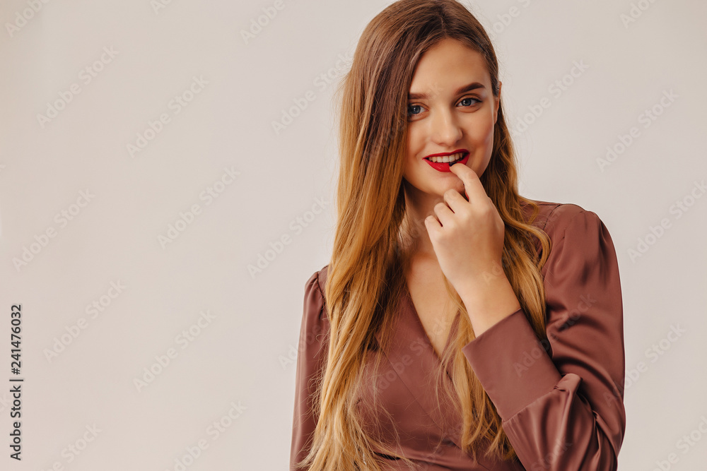 closup portrait attractive stylish young girl near the window in light interior closup portrait attractive stylish young girl near the window in light interior