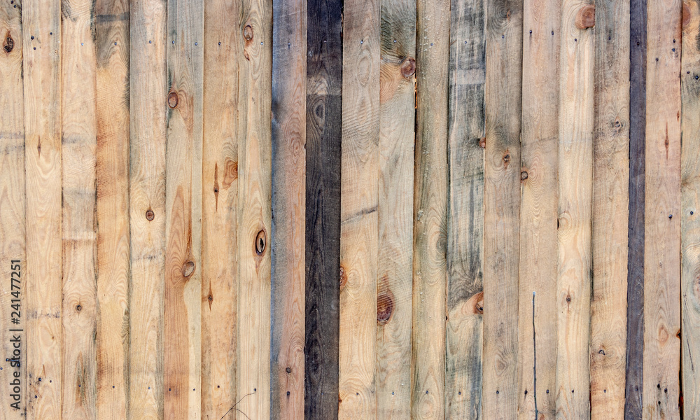 Multicolored wooden surface with old faded paint texture Multicolored wooden surface with old faded paint texture