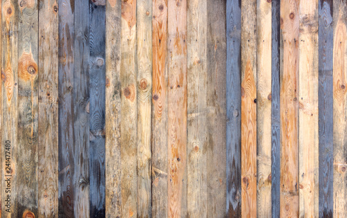 Multicolored wooden surface with old faded paint texture