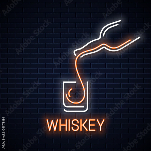 whiskey glass neon banner. Bottle of whisky neon sign on black wall background