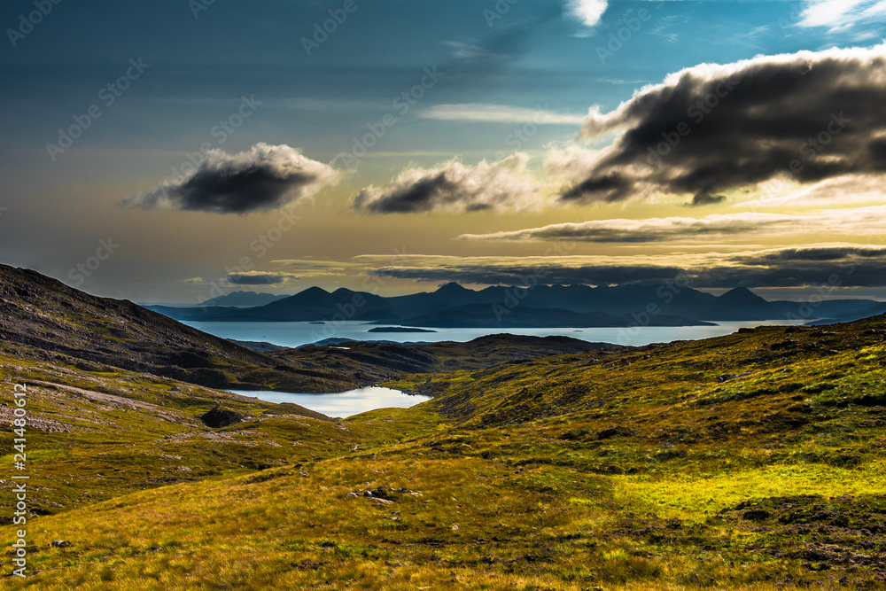 View From Applecross Pass To Scenic Landscape With Curvy Single Track Road And The Isle Of Skye In Scotland