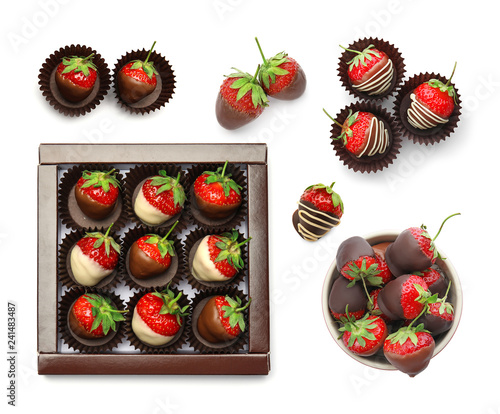 Set with chocolate covered strawberries on white background, top view