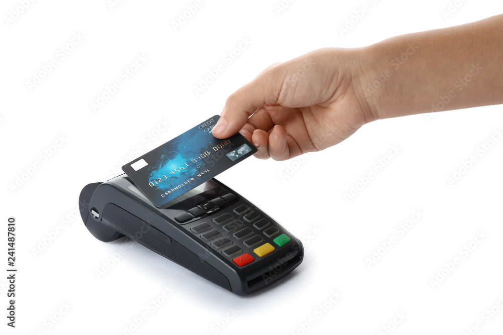 Woman using terminal for contactless payment with credit card on white background Woman using terminal for contactless payment with credit card on white background
