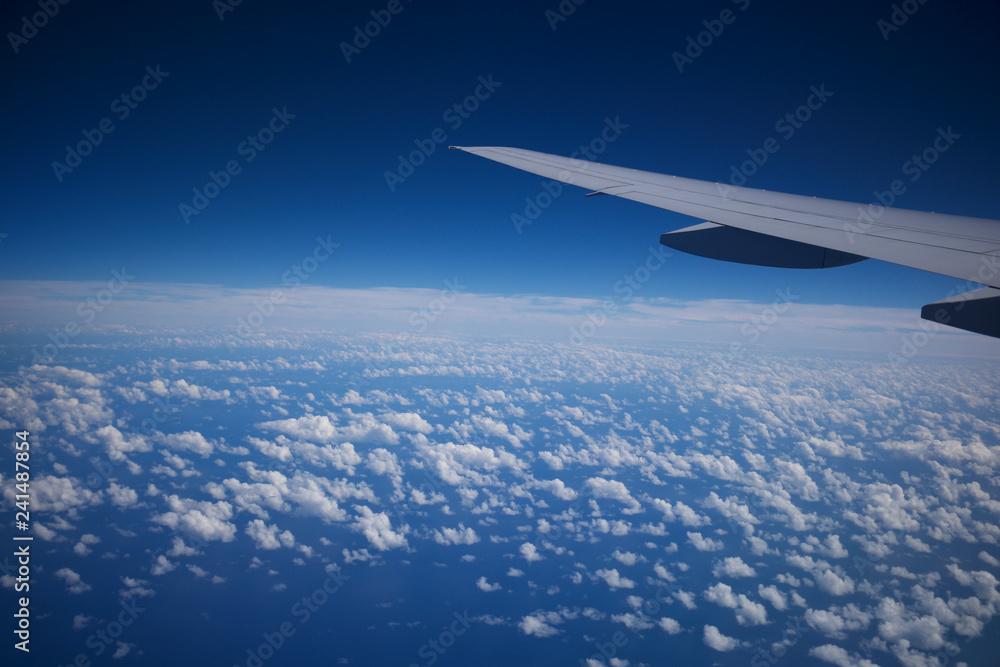 plane over the ocean plane over the ocean