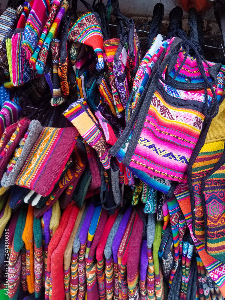 Background of colored fabrics from a traditional ethnic market.