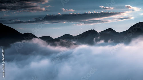 Chain of mountains in Itaipava, Rio de Janeiro, Brazil, featuring dense fog that looks like clouds