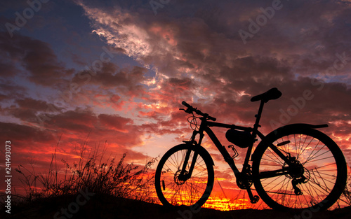 bike in the background fire sunset.