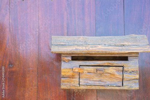 mailbox on wooden wall